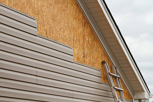 Professional Storm Damage Siding Repair technician working in Salem, NC